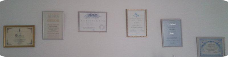 beauty treatement certificates on wall for Lorna London